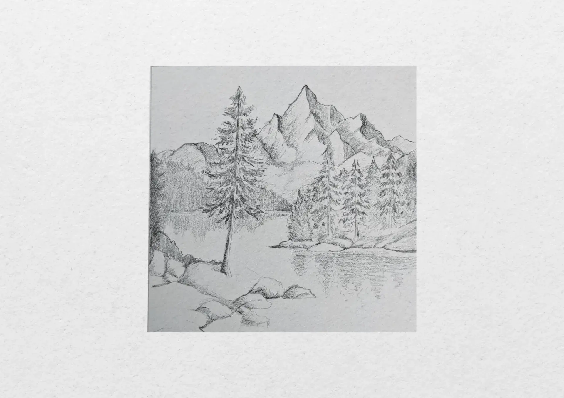 dessiner les reflets d’un lac entouré de montagnes