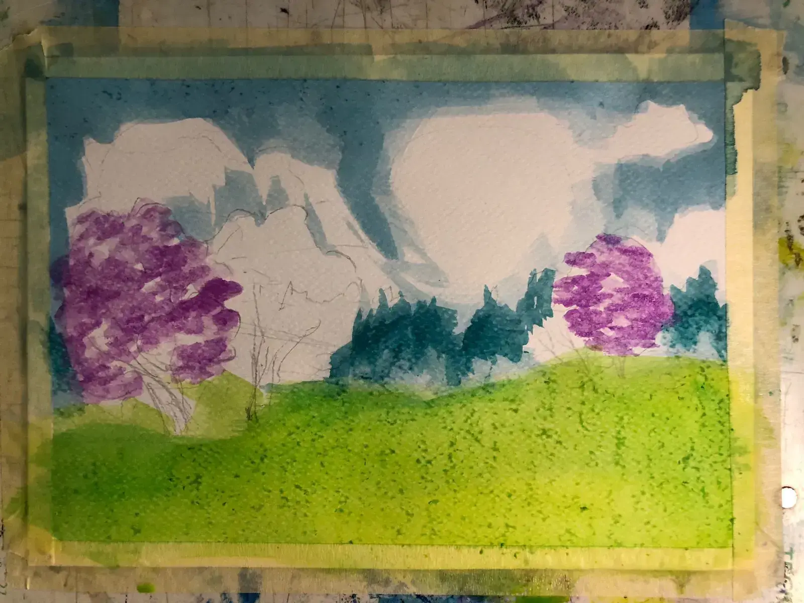 pintar los árboles de un paisaje primaveral con acuarela