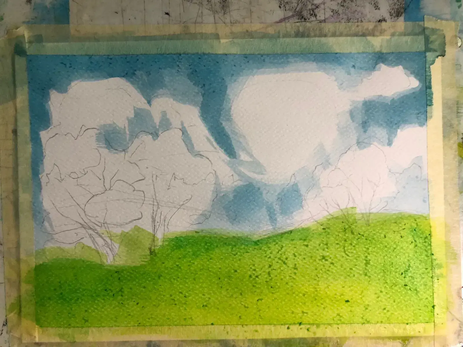 pintar la hierba de un paisaje primaveral con acuarela