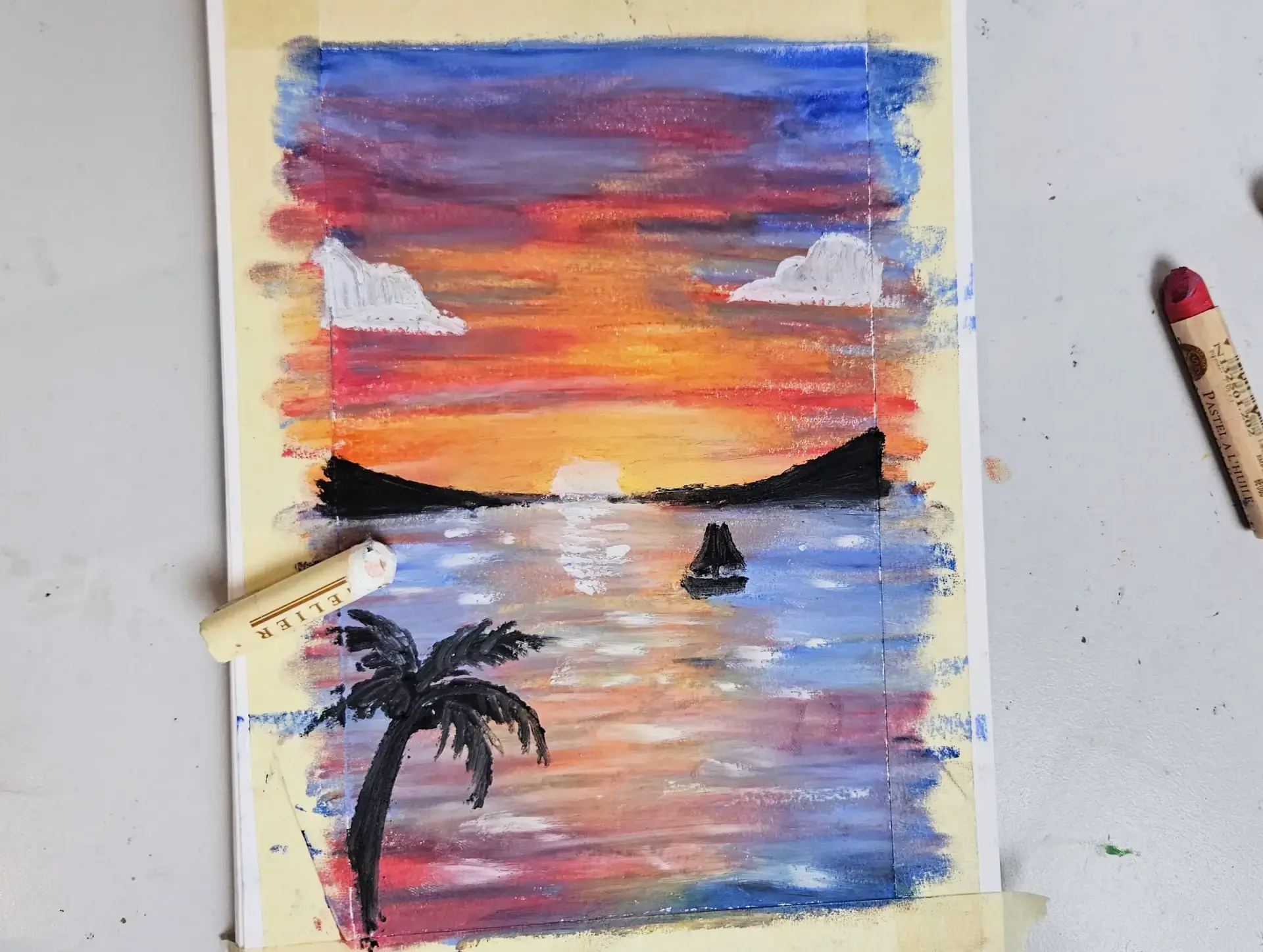 dessiner les nuages d’un coucher de soleil avec des pastels à l’huile